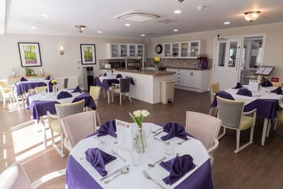 Dining area with tables set for a meal