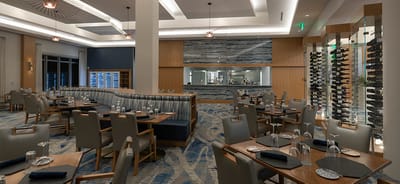 Elegant dining room with modern decor and seating