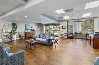 Bright common area with comfortable seating and natural light