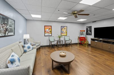 Common area with comfortable seating and movie posters