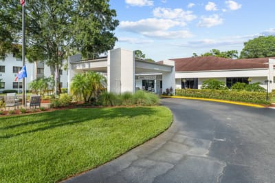Exterior view of the facility entrance and landscaping