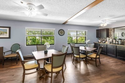 Bright common area with tables and chairs