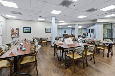 Bright common area with tables and decorations