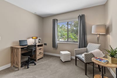 Cozy resident room with desk and chair