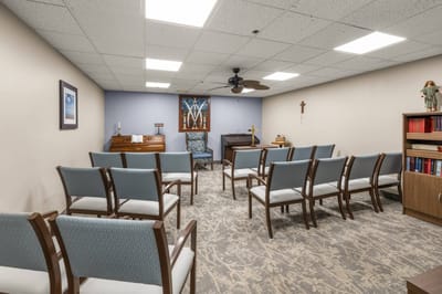 A quiet interior room set up for activities or services