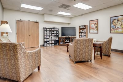 Cozy common area with seating and a TV