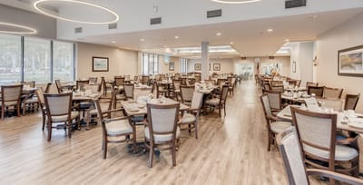 Bright and inviting dining area with tables set for meals