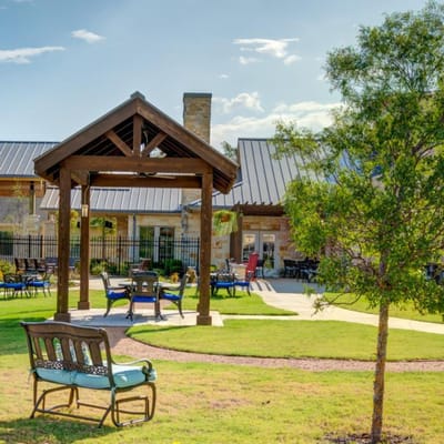 Outdoor seating area with gazebo and garden