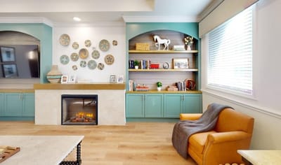 Inviting common area with shelves and seating