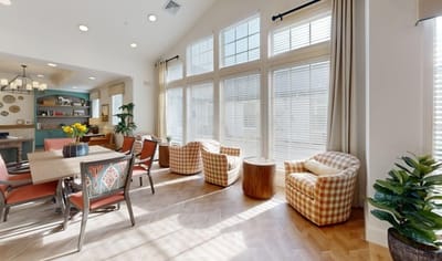 Bright common area with seating and natural light