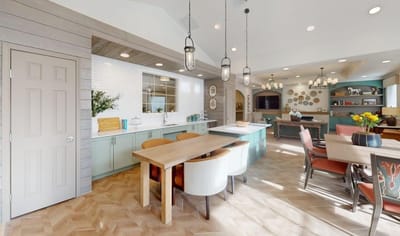 Bright common area with dining and lounge seating