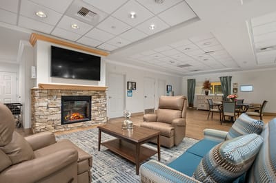 Interior common area with fireplace and seating