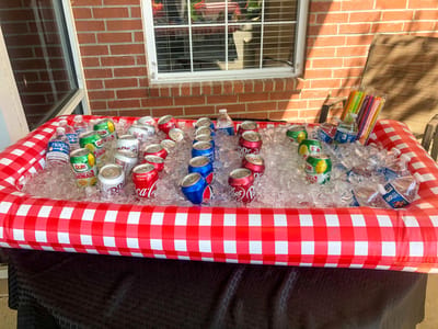 Outdoor beverage station with ice and drinks for residents