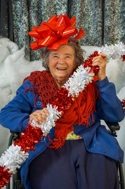 Resident celebrating with festive decorations