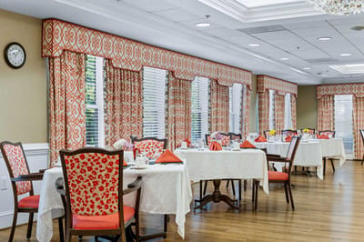 Bright dining area with tables set for meals
