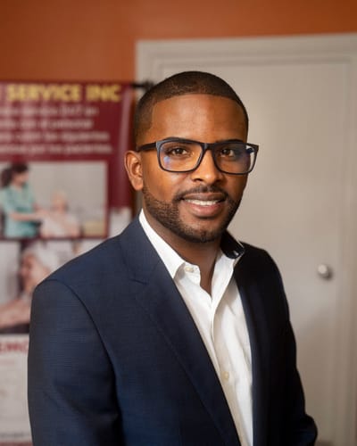 Smiling man in a professional suit indoors