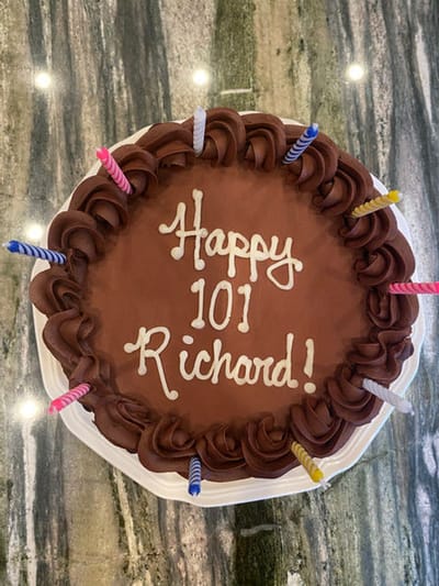 A chocolate cake for a 101st birthday celebration.