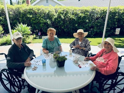 Residents enjoying a game outdoors together.