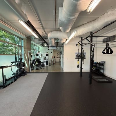 Interior view of a physical therapy gym area.