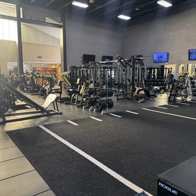 Well-equipped gym area with fitness equipment.