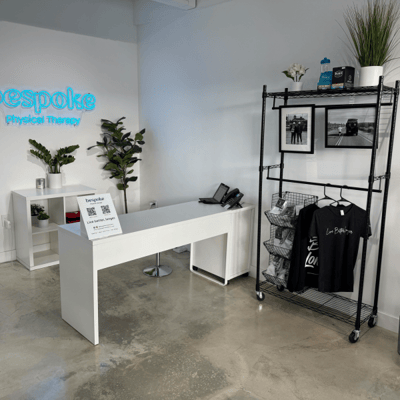 Reception area with therapy equipment and decor.