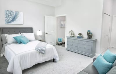 Bright interior of a resident's bedroom with decor