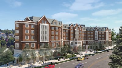 Exterior view of a senior living facility with landscaping
