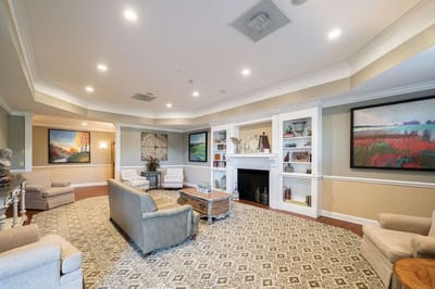 Cozy common area with comfortable seating and art