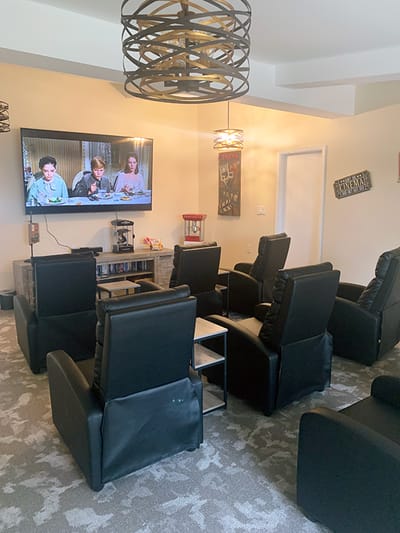 Comfortable seating in a cozy common area with TV