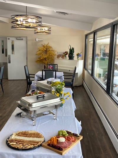 Dining area with a buffet of assorted foods