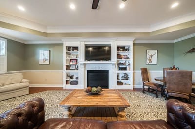 Cozy common area with seating and a fireplace