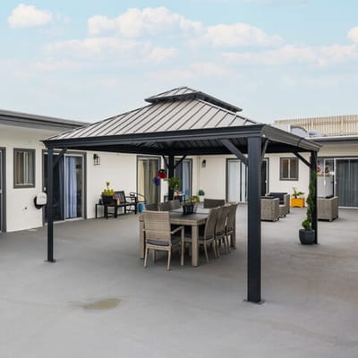 Outdoor seating area with a gazebo and tables