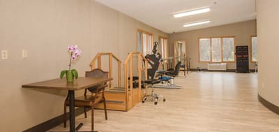 Interior view of a rehabilitation area with exercise equipment