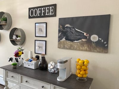 Decorative coffee station with art and fruit