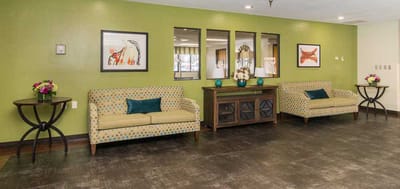 Interior common area with sofas and artwork