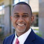 Always Best Care Senior Services, nursing home in Kernersville, NC — Smiling man in a professional suit outdoors