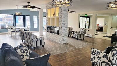 Bright common area with seating and natural light