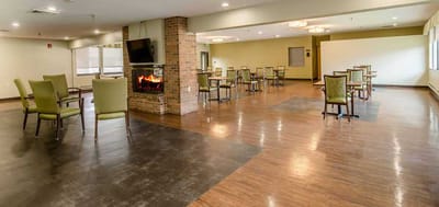 Bright common area with tables and chairs