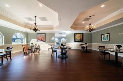 Bright common area with tables and chairs