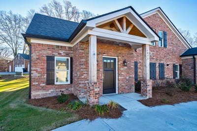 Exterior view of a brick senior living facility