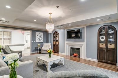 Bright common area with comfortable seating and decor