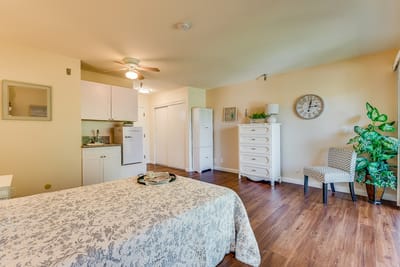 Cozy resident room with a bed and seating area