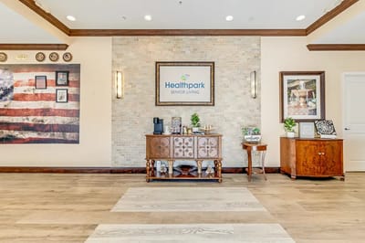Bright lobby area with decorative elements and signage