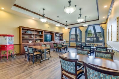 Bright common area with tables and chairs