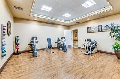 Interior view of a fitness area with exercise equipment