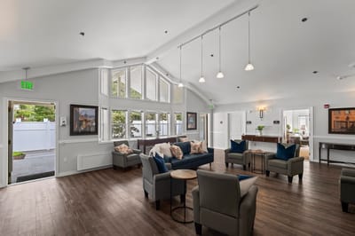 Bright common area with comfy seating and natural light