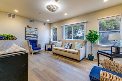 Bright common area with comfortable seating and decor