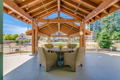 Outdoor seating area with a view of the facility