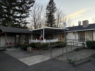 Exterior view of Mountain View Care Home with porch.