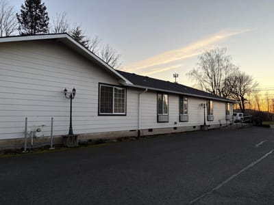 Exterior view of Mountain View Care Home at sunset.